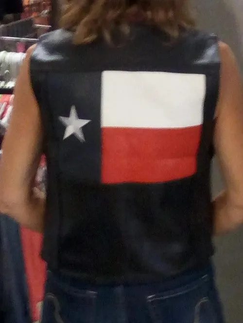 Ladies black leather vest with Texas Flag on back TS8PS