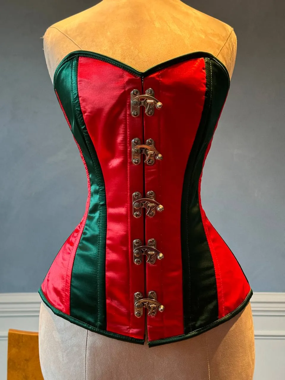 Overbust red and green satin in Santa style with steampunk closure hooks in the front. Corset is made personally according to your measurements.